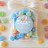 Gepersonaliseerde geboortesticker met teddybeer en luchtballon op snoepzakje - Creations and More