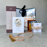 Eid cadeau voor haar giftbag met drinkfles, gebedskleed en selfcare items als islamitisch cadeau