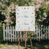 Welkomstbord bruiloft wilde bloemen sierlijke letters - Creations and More